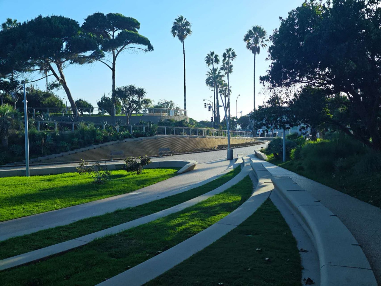 Curving paths, planted terraces and seating at Tongva Park in Santa Monica.